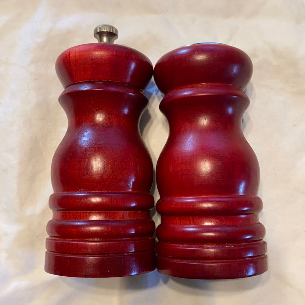 Salt and pepper shaker/grinder set. Red wood